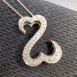 Jane Seymours diamond encrusted open heart pendant in 14K white gold